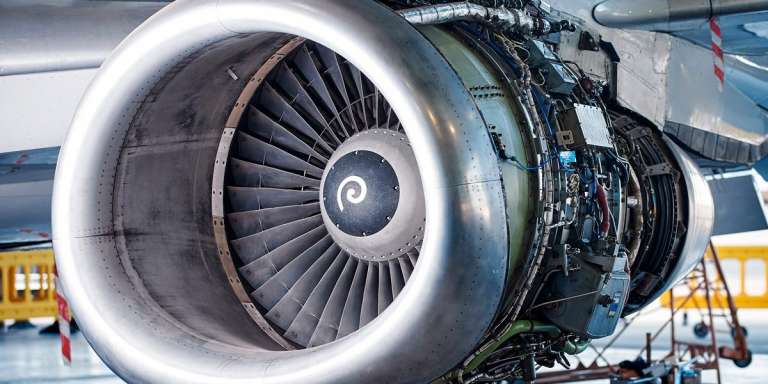 jet engine up close under maintenance in hangar 1200x600